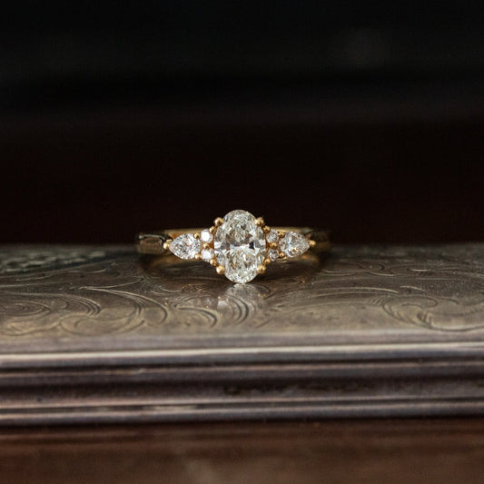 Oval Diamond Solitaire with Diamond Shoulders