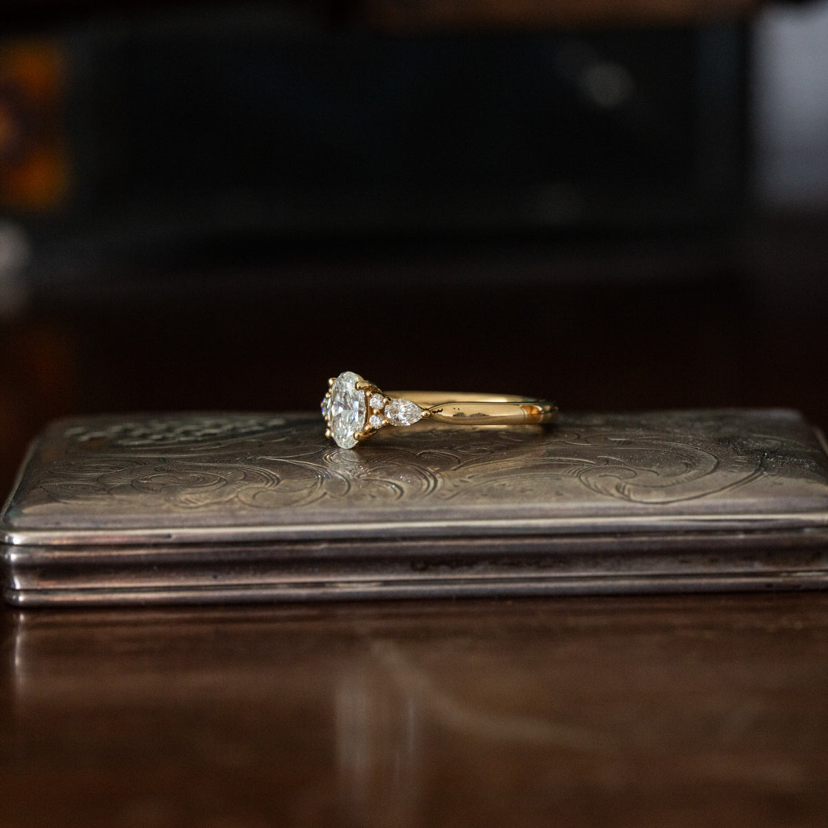 Oval Diamond Solitaire with Diamond Shoulders