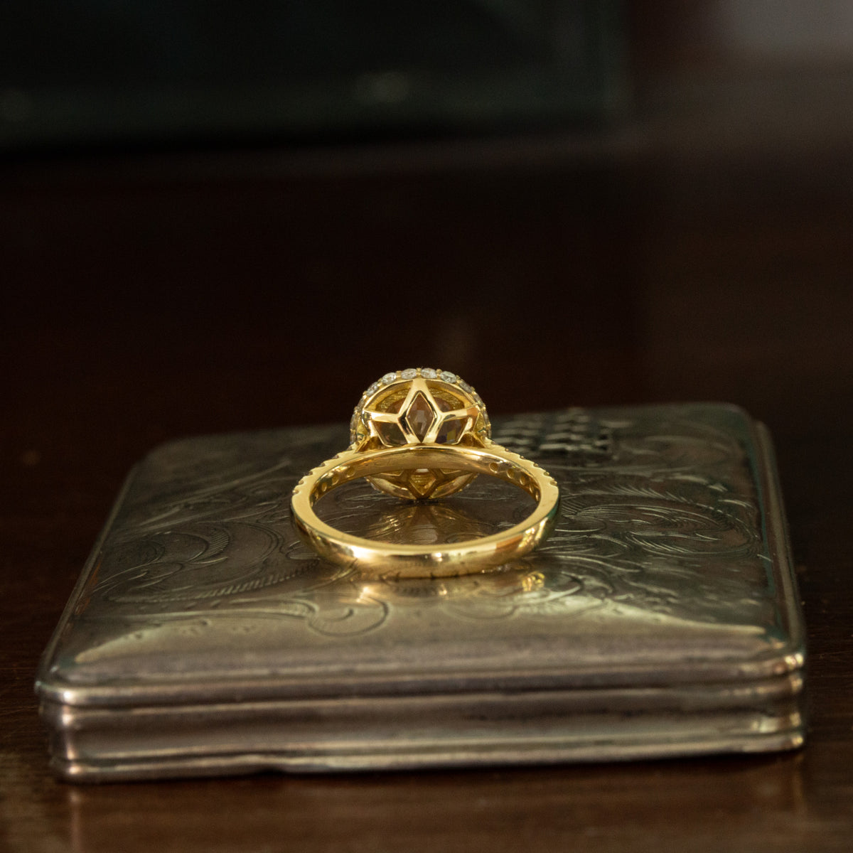 Orange Sapphire and Diamond Ring