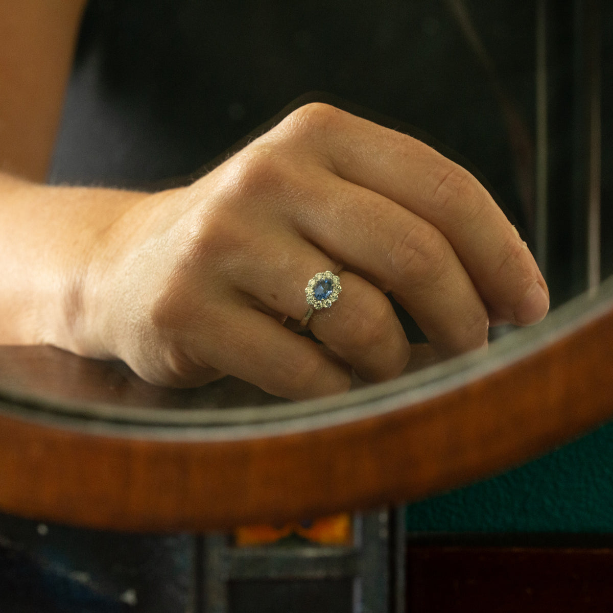 Oval Horizontal Blue Sapphire and Diamond Cluster Ring