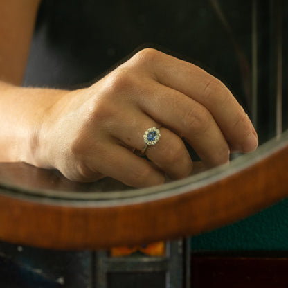 Oval Horizontal Blue Sapphire and Diamond Cluster Ring