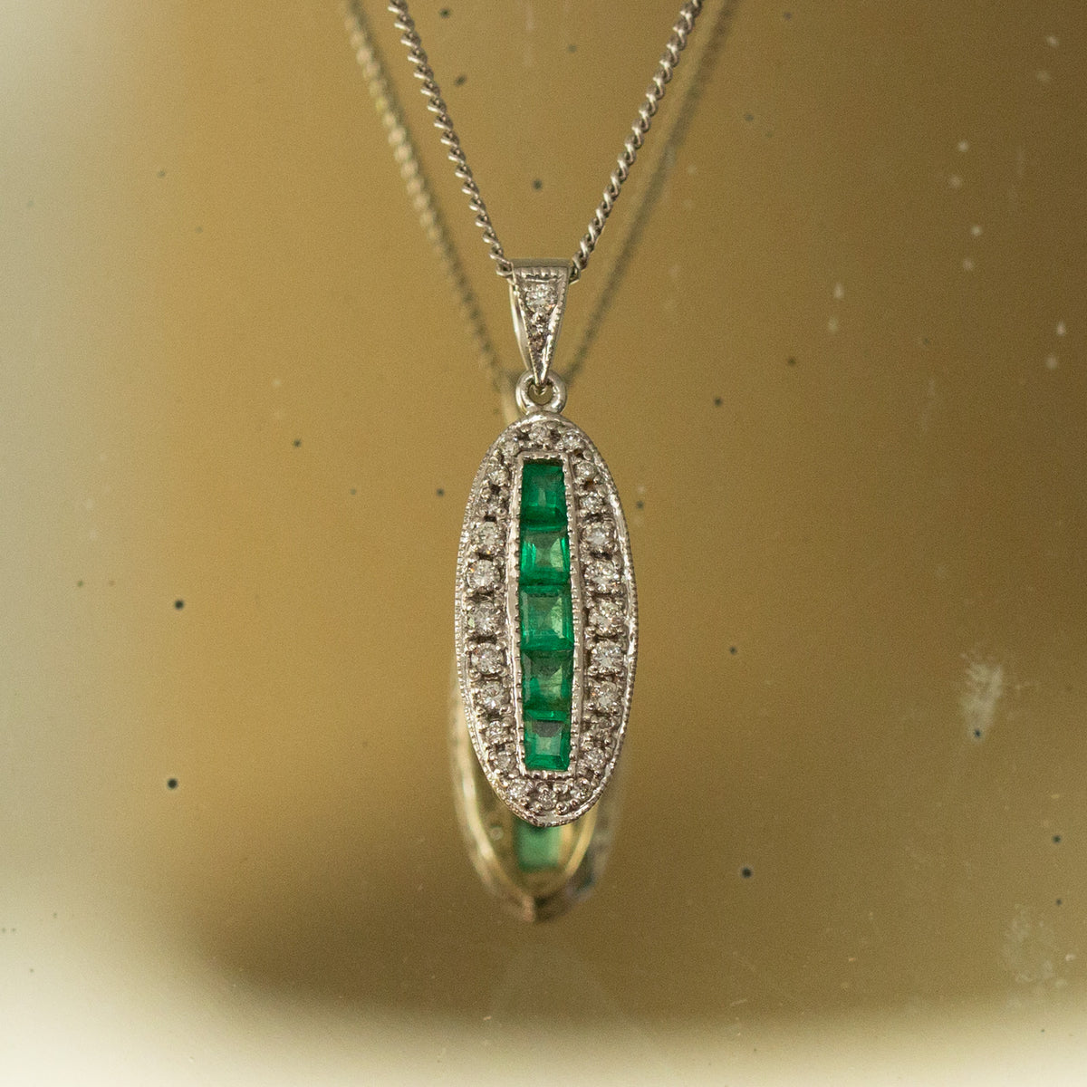Oval Emerald and Diamond Pendant
