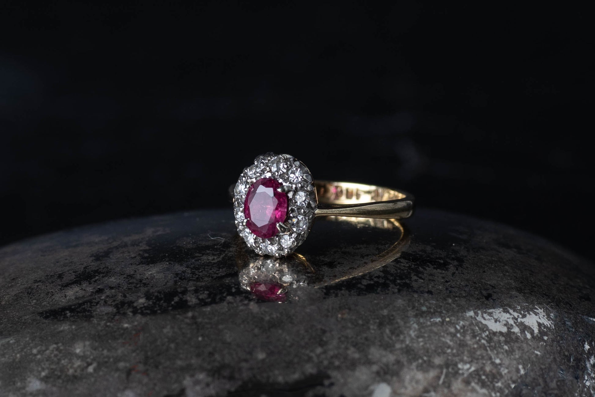 Antique Oval Ruby and Diamond Cluster Ring — view 2