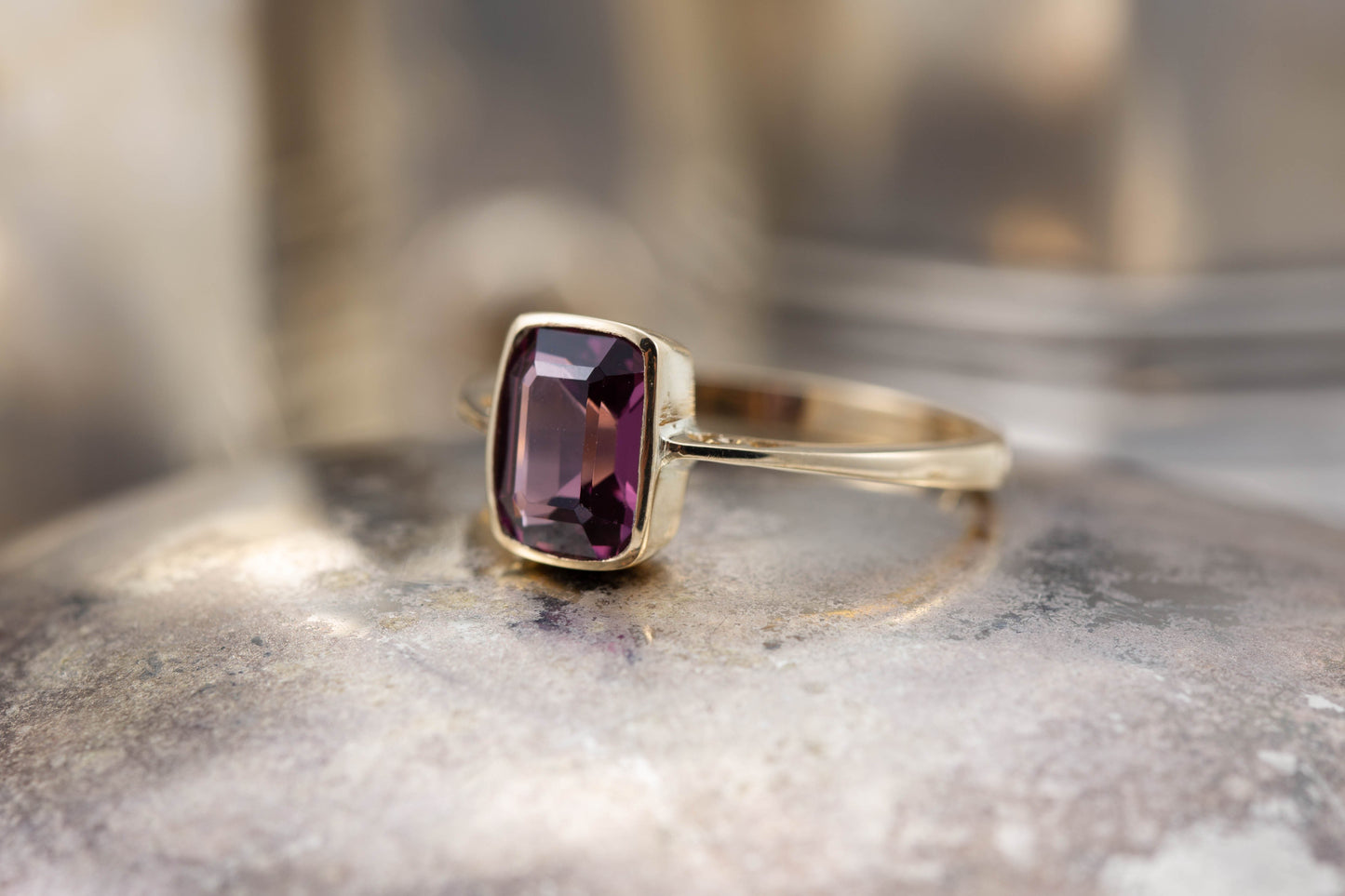 A Garnet Solitaire Ring — view 3