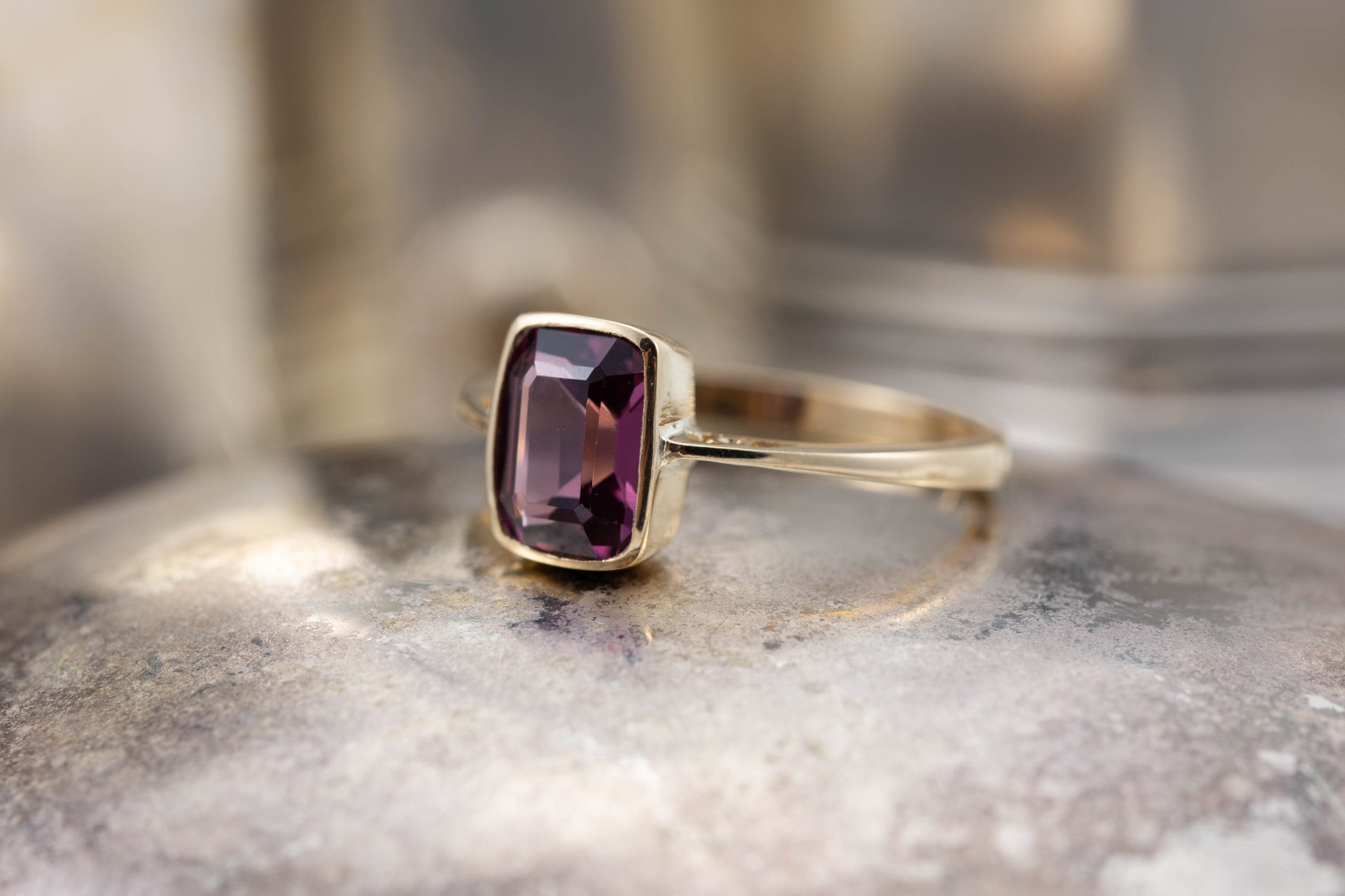 A Garnet Solitaire Ring — view 3