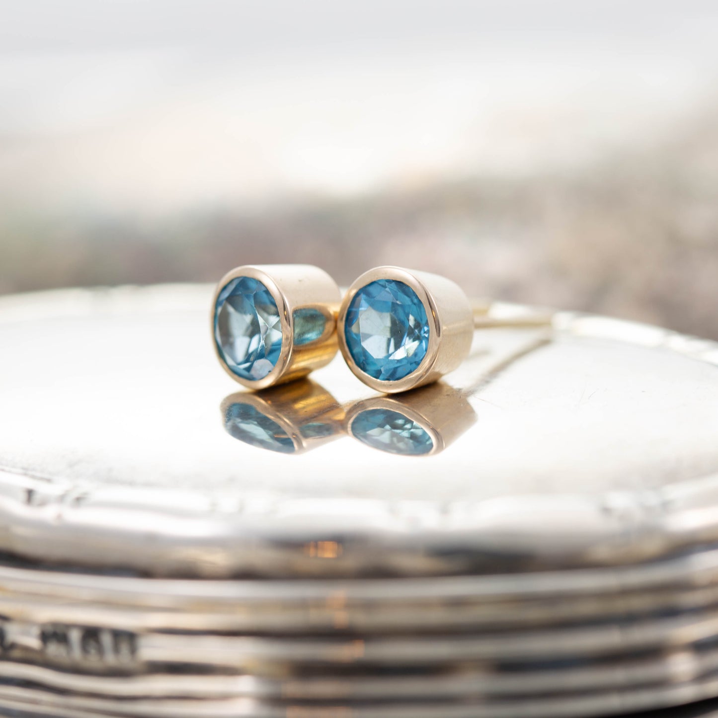 Yellow Gold Blue Topaz Stud Earrings — view 3