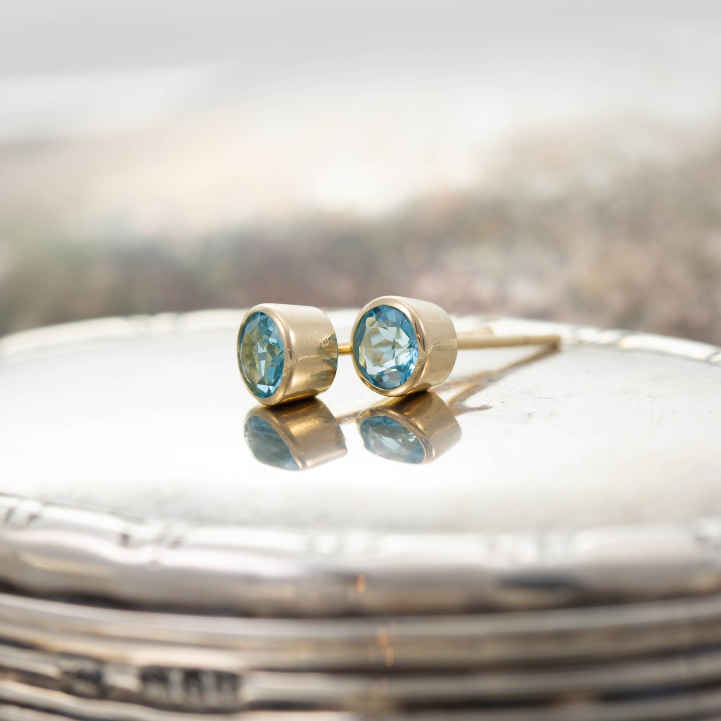 Yellow Gold Blue Topaz Stud Earrings — view 3