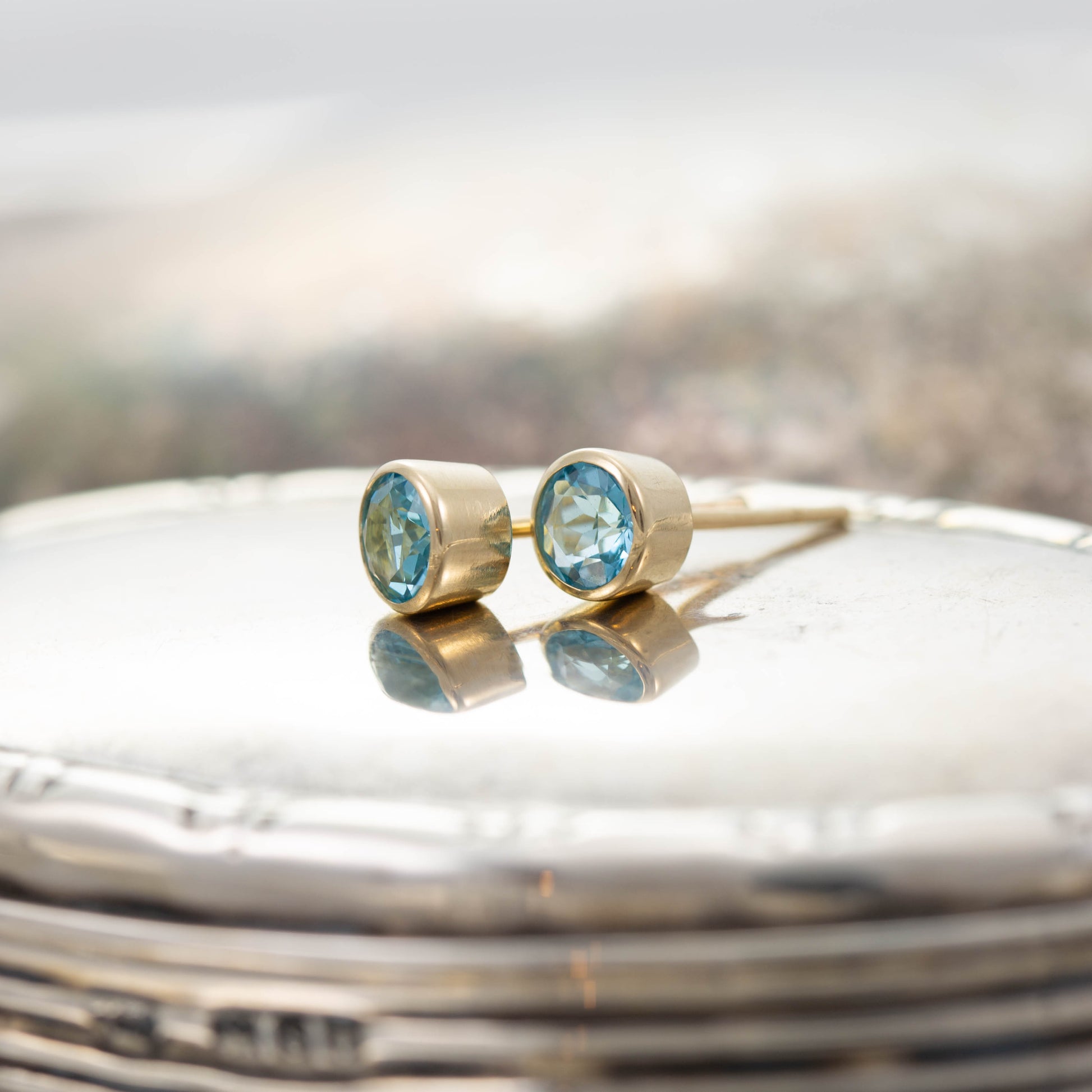 Yellow Gold Blue Topaz Stud Earrings — view 3