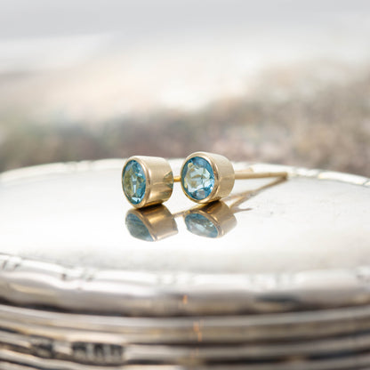 Yellow Gold Blue Topaz Stud Earrings — view 3