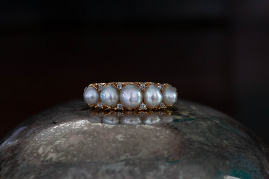 A Victorian Pearl and Diamond Half Hoop Ring