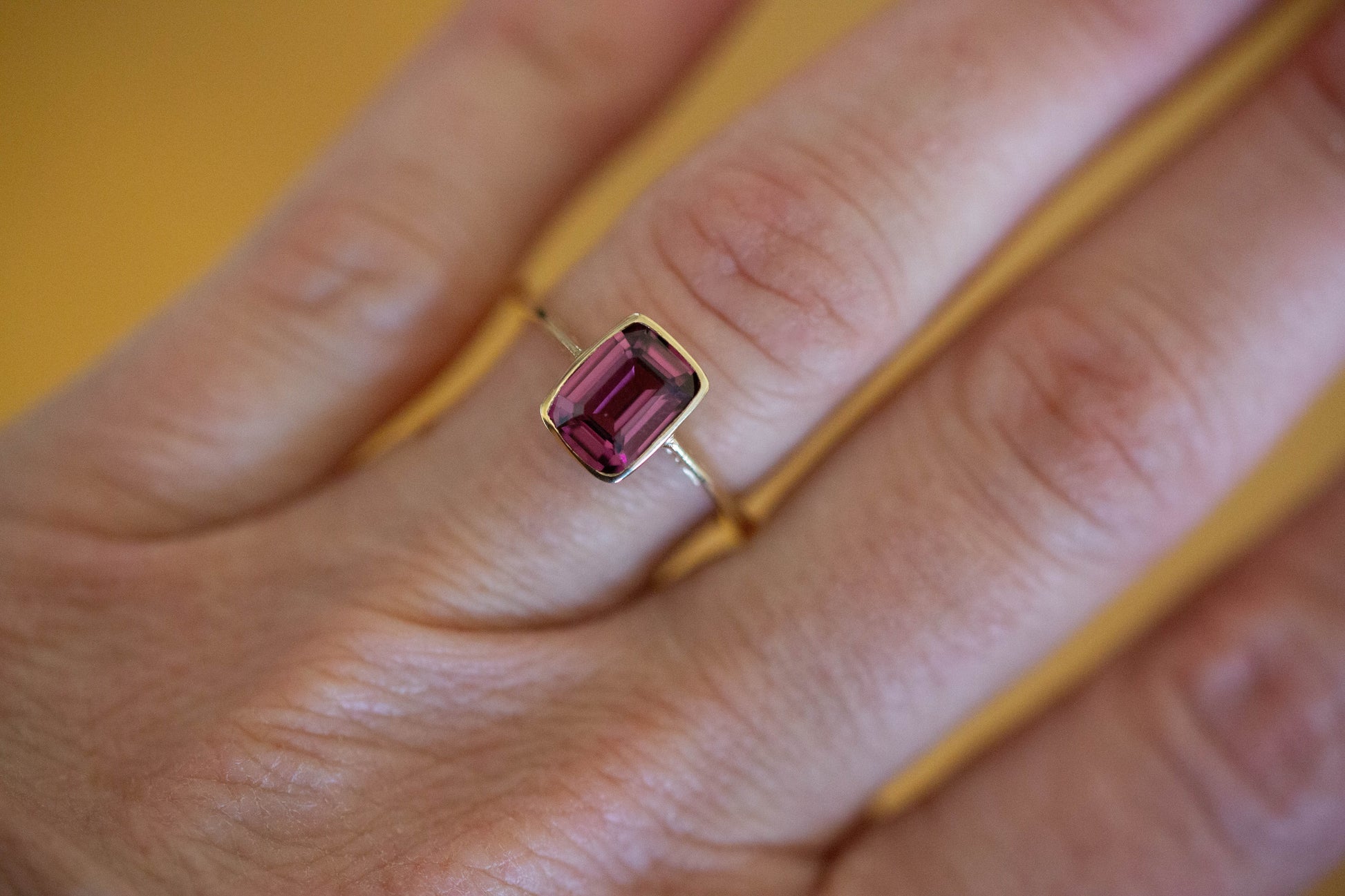 A Garnet Solitaire Ring — view 2