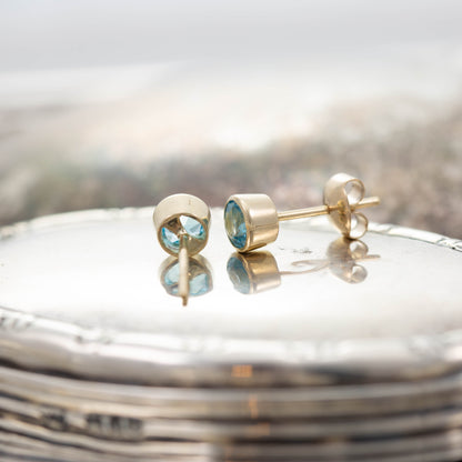 Yellow Gold Blue Topaz Stud Earrings — view 5